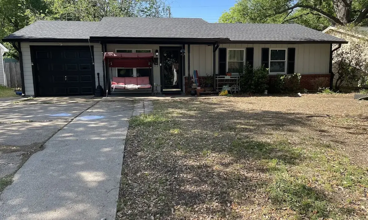 Asphalt Shingle Roof Repair crew at work on a residential roof in Wake Forest